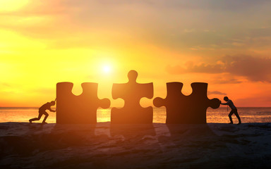 Business concept of teamwork with jigsaw puzzle. Business success