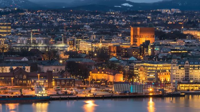 Oslo Norway time lapse 4K, city skyline day to night timelapse at City Hall and harbour