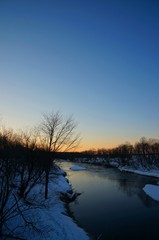 Cranes in River at Sunrise