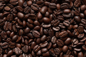 Texture roasted coffee beans, can be used as a background. Brown coffee beans, close-up of coffee beans for background and texture