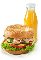 Fresh crusty roll with ham, cheese and salad