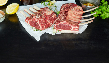 Two racks of lamb with raw chops