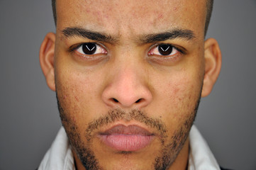 bald Man on grey background expressive portrait