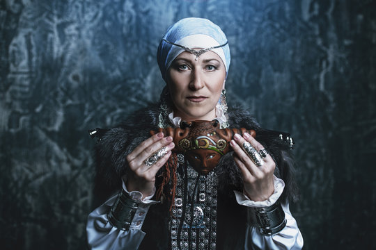 european woman with reedpipe