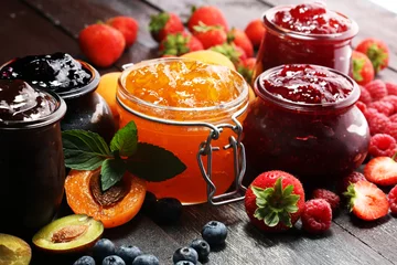Foto op Plexiglas assortment of jams, seasonal berries, apricot, mint and fruits. marmalade or confiture © beats_