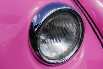 pink retro car headlight