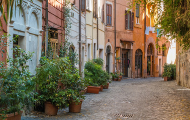 Fototapeta na wymiar The pictiresque Rione Trastevere on a summer morning, in Rome, Italy.