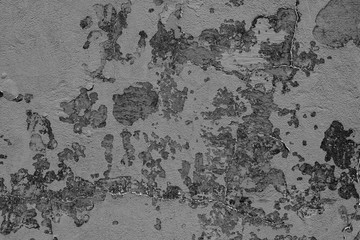 Wall fragment with scratches and cracks