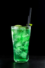 Mojito Cocktail on black background. Glass beaker.