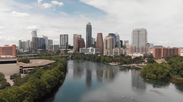 Flying away from the Austin, Texas Skyline above the Colorado River on a Hot Summer Day