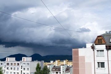 Heavy storm clouds and strong wind over the town. Slovakia