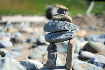 Fototapeta na wymiar stack of stones at beach in lands end in Lands End, San Francisco, United States