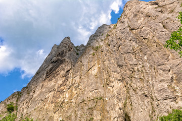Vintage look of beautiful mountain peak with blue sky and clouds