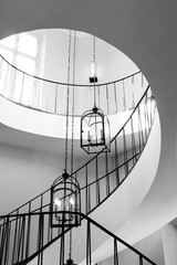 old antique spiral against the background of a glowing window