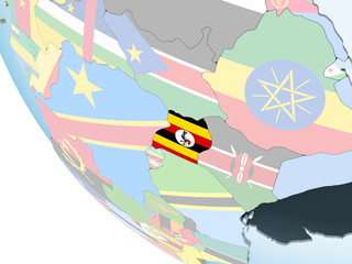 Uganda with flag on globe
