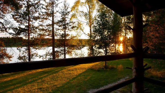 Long timelapse of sun setting from terrace at a summer cottage in finland