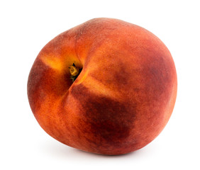Ripe peach close up on a white background.