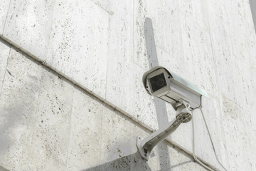 Optical CCTV camera surveillance security camera video equipment in tower home and house building on the modern building wall for safety system area control outdoor with copyspace. Private property 