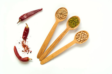 Wooden Spoon  with  Raw cereals isolated on white background. The concept of cereals organic products, healthy diet, choice of clean food, copy space,close up,