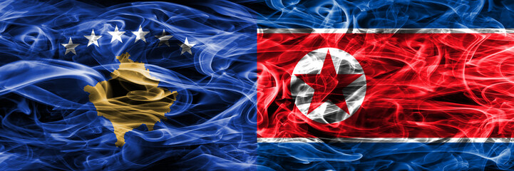 Kosovo vs North Korea smoke flags placed side by side