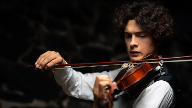 young handsome violinist Stock Photo | Adobe Stock
