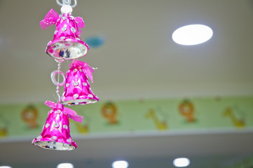 Pink school bell . Pink bell decorate on Christmas .