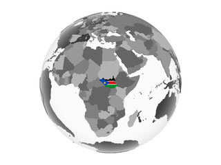 South Sudan with flag on globe isolated