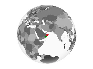 Obraz na płótnie Canvas Oman with flag on globe isolated