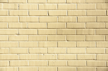 A closeup of a painted brick wall.