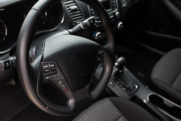 Obraz na płótnie Canvas Car Dashboard and Steering Wheel