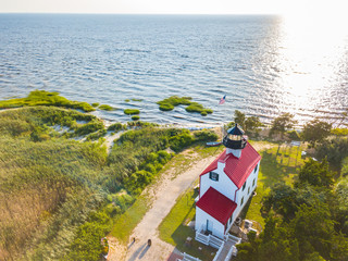 Aerial Drone image of the East Point Lighthouse on the Maurice River entrance to the Delaware Bay outside of Cape May