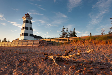 West Point lighthouse in Prince Edward Island at sunset - 218133948