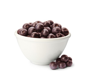 Bowl with fresh acai berries on white background