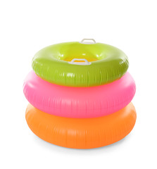 Naklejka premium Different inflatable rings on white background. Summer holidays