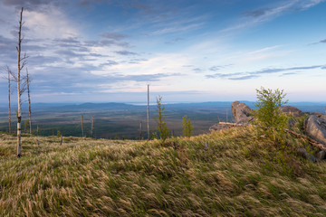 Fototapeta na wymiar Mountains in the far east of Russia, Khabarovsk region. A mountain range near the city of Komsomolsk-on-Amur.
