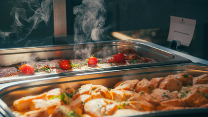 buffet, dishes are beautifully on the table.