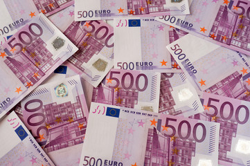 Fototapeta na wymiar Five hundred euros banknotes in chaos