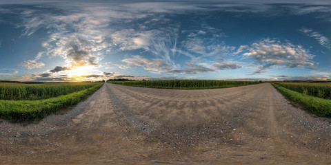 full seamless spherical panorama 360 degrees angle view on gravel road among fields in summer...