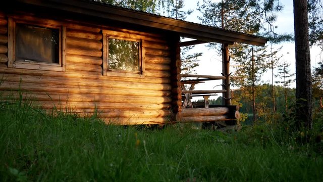 Log cabin in evening light