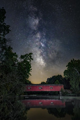 Fototapeta na wymiar Milky Way Over Mill Creek - Cataract Covered Bridge, Indiana