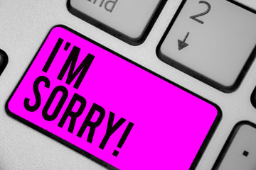 Text sign showing I am Sorry. Conceptual photo To ask for forgiveness to someone you unintensionaly hurt Keyboard purple key Intention create computer computing reflection document.