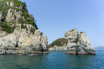 Fototapeta na wymiar Geoje Haegeumgang, The rock island emerge from the sea in the Hanryeo marine national Park, Geoje City, South Korea.