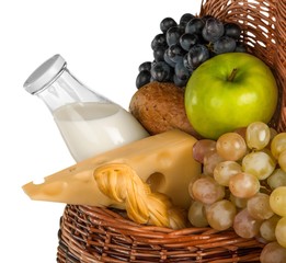 Cheeses, Apple, Grapes, Roll and Milk in the Picnic Basket -