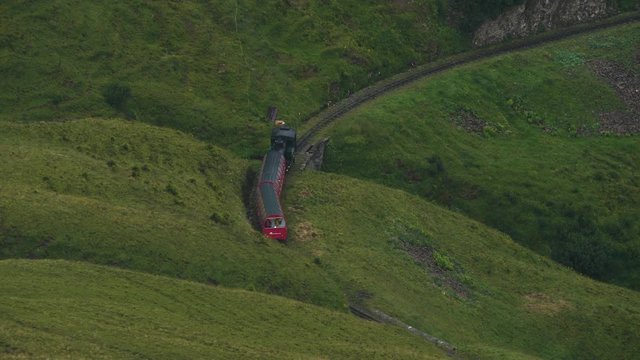 vintage steam train on a mountain track old train locomotive tourism attraction in the swiss alps brienzer rothorn