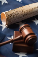 Fototapeta premium Gavel on American Flag with Constitution