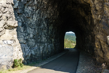 Little Tunnel Kettle Valley Railway biking trail summer near Penticton British Columbia Canada.