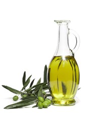 Bottle of Olive Oil with Green Olives on the Branch