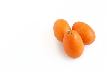Fresh Juicy Kumquat on White Background