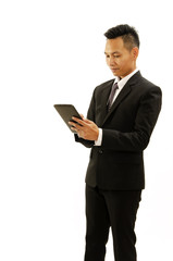 Obraz na płótnie Canvas Asian business man hand holding tablet device on white backgrounds