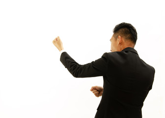 Backside views of Asian business man pulling action from top Isolated on white backgrounds